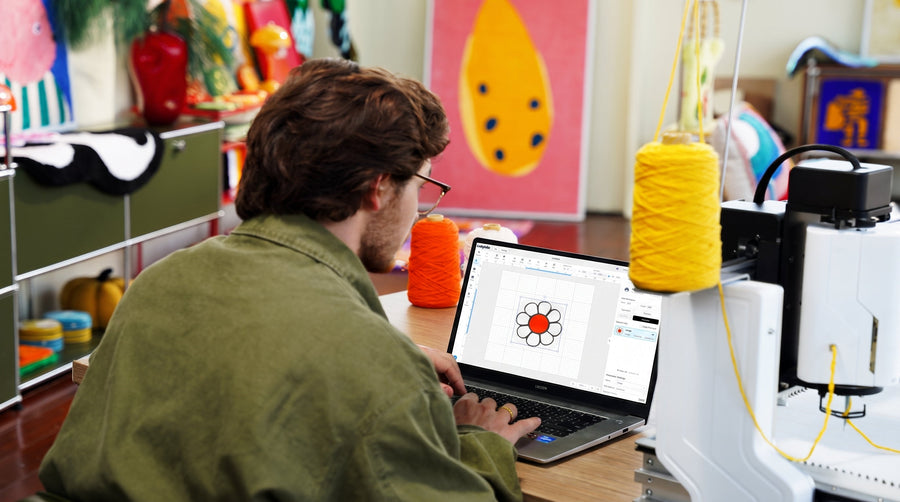 Craftphilia Studio with flower design next to an tufting machine