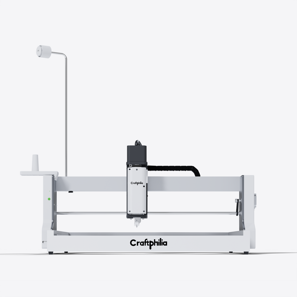 A Craftphilia 50cm*50cm desktop Automatic tufting machine shown in a clean studio shot against a light gray background. The Automatic tufting machine features a white metal frame with a black and white gantry system holding the print head.