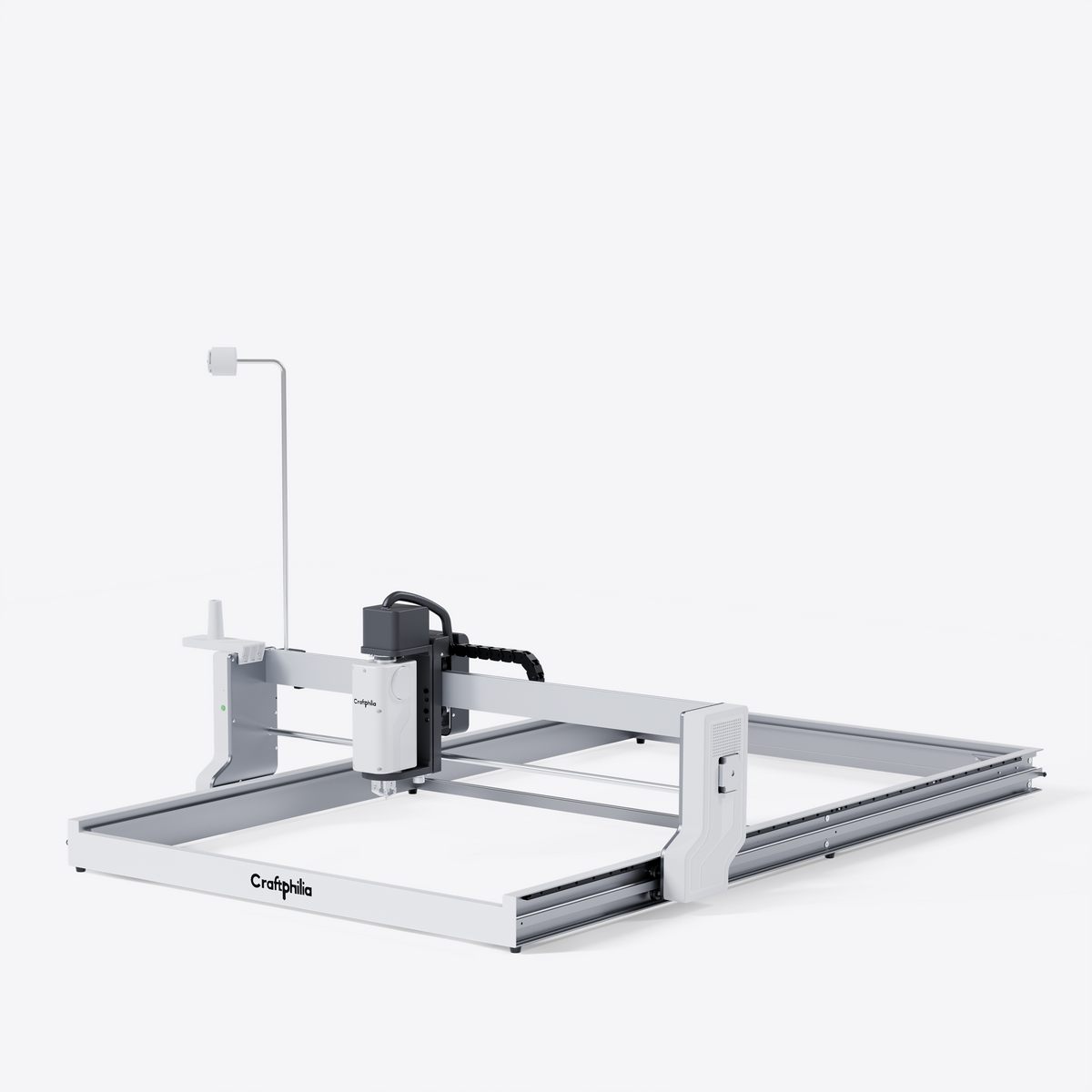 A Craftphilia 70cm*140cm desktop automatic tufting machine shown in a clean studio shot against a white background. The machine features a white metal frame with a black and gray motorized spindle head, a vertical light guide, and the 'Craftphilia' brand name printed on the front.