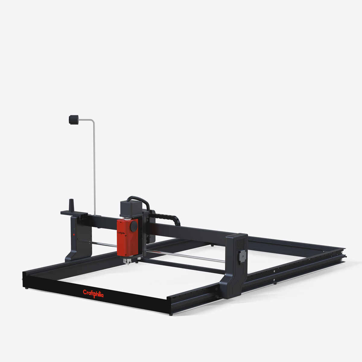 Craftphilia desktop 70cm*140cm automatic tufting machine shown in profile against a solid white background. The machine features a black steel frame with a prominent red vertical tufting head.